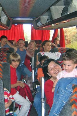 Children on bus going on holiday, Serbia