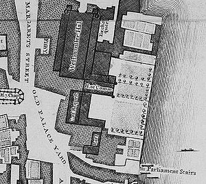 The Old Palace  was a complex of buildings, separated from the River Thames in the east by a series of gardens. The largest and northernmost building is Westminster Hall, which lies parallel to the river. Several buildings adjoin it on the east side, south of those and perpendicular to the Hall is the mediaeval House of Commons, further south and parallel to the river is the Court of Requests, with an eastwards extension at its south end, and at the south end of the complex lie the House of Lords and another chamber. The Palace was bounded by St Margaret's Street to the west and Old Palace Yard to the south-west; another street, New Palace Yard, is just visible to the north.