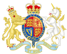 Coat of arms featuring a shield with UK insignias in centre with large crown above, supported by lion and unicorn.