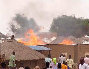 Fire in Parabongo IDP camp, Uganda crop.jpg