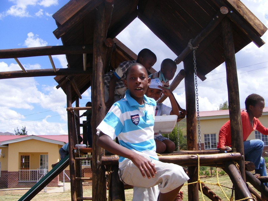 A child on a jungle gym, Lesotho