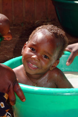 child having a bath Lilongwe Malawi