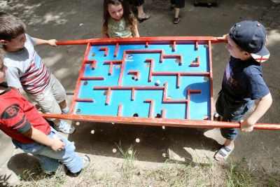 Children playing games provided by SOS Playbus in Tbilisi, Georgia