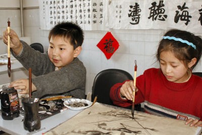Children drawing in SOS Social Centre in Tianjin, China
