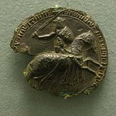 Parcialmente en ruinas sello negro, mostrando Eduardo III a caballo, con armadura y espada en alto.