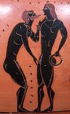 Escena de cortejo pederasta ateniense negro-figura ánfora, quinto c. BC, Pintor de Cambridge; Objeto actualmente en la colección de la Staatliche Antikensammlungen und Glyptothek, Munich, Alemania. El hombre de la barba se representa en un gesto de cortejo pederasta tradicional conocido como el