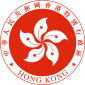 Un emblème circulaire rouge, avec un blanc conception de fleur 5 pétales dans le centre, et entouré par les mots