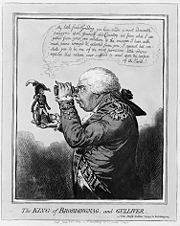 Um Napoleão período de alta fica na mão estendida de um full-size George III, que perscruta para ele através de um vidro de espião.