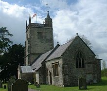 Pequena igreja de pedra com torre quadrada