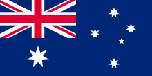 Bandeira azul escura com seis estrelas brancas e bandeira da União como quarto superior esquerdo