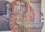 A bank note depicting a man's head facing to the right