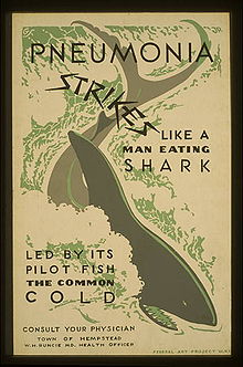 Um cartaz com um tubarão no meio dela que lê