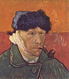Portrait of a clean shaven man wearing a furry winter hat and smoking a pipe; facing to the right with a bandaged right ear